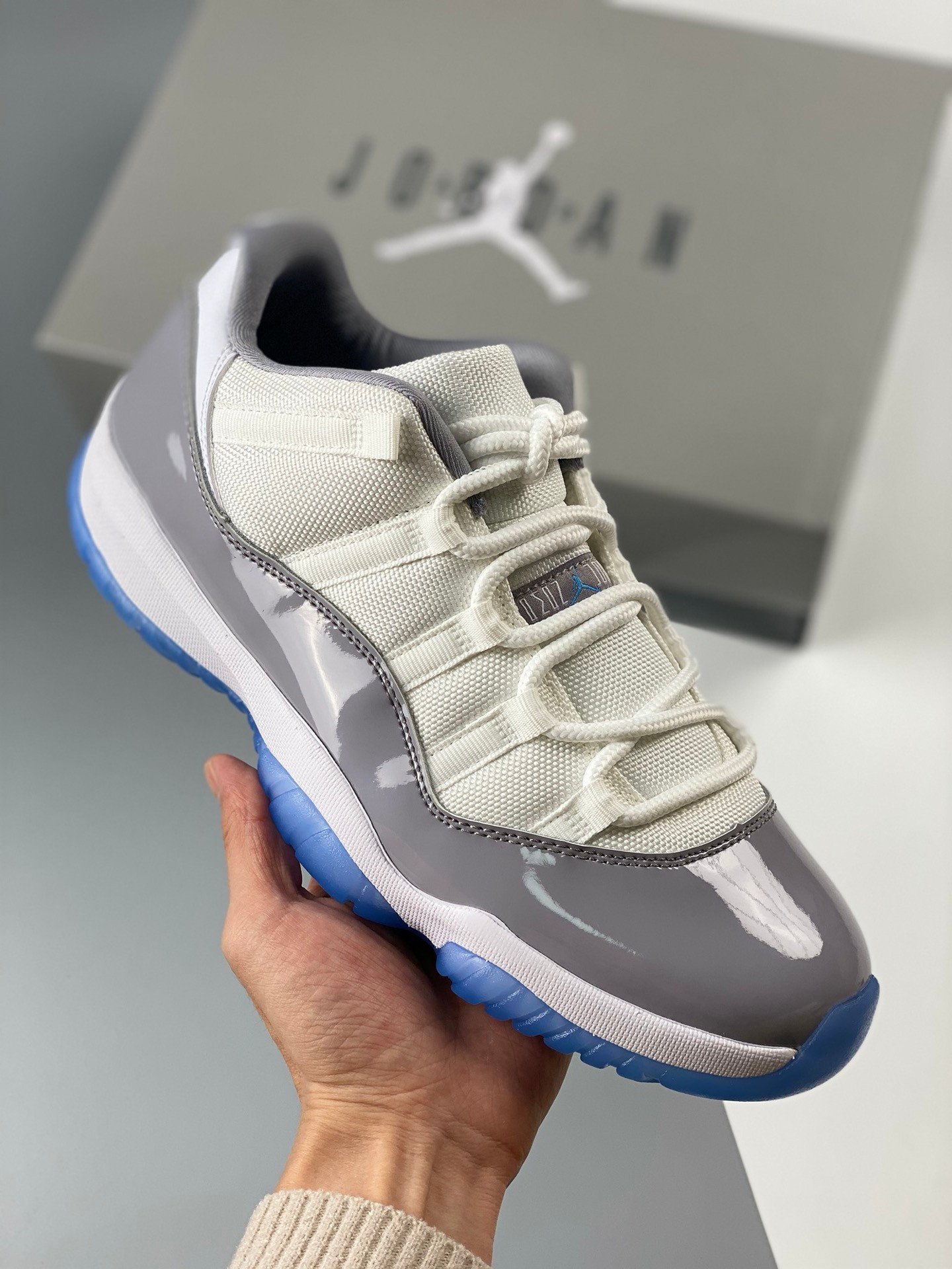 Air Jordan 11 Low White/University Blue/Cement Grey AV2187-140